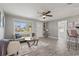 Cozy living room with modern accents, bright lighting, and easy access to other areas of the house at 3102 16Th W Ave, Bradenton, FL 34205