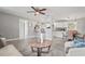 Open-concept living room featuring modern decor and seamless transition to the kitchen at 3102 16Th W Ave, Bradenton, FL 34205