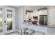 Well-equipped kitchen with stainless steel appliances, granite countertops, and a breakfast bar for casual dining at 3118 Torta Ct, Bradenton, FL 34211