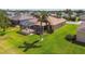 Spacious backyard with a screened-in lanai, ideal for outdoor living and entertaining at 327 64Th Avenue E Cir, Bradenton, FL 34203