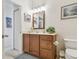 Bathroom featuring vanity, sink, and toilet at 327 64Th Avenue E Cir, Bradenton, FL 34203