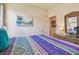 Guest bedroom featuring a closet, dresser, and coastal themed artwork at 327 64Th Avenue E Cir, Bradenton, FL 34203