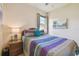 Guest bedroom featuring a window with a view of the neighborhood at 327 64Th Avenue E Cir, Bradenton, FL 34203
