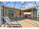 Enjoy the outdoors on this spacious patio, complete with a seating area and a convenient grill for summer cookouts at 327 64Th Avenue E Cir, Bradenton, FL 34203