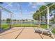 Screened-in patio with a beautiful view of the lake, perfect for relaxation and entertaining at 327 64Th Avenue E Cir, Bradenton, FL 34203