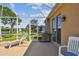 Relax in style on this screened-in patio, featuring comfortable seating and a convenient grill at 327 64Th Avenue E Cir, Bradenton, FL 34203
