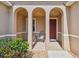 Inviting front porch with seating area, perfect for enjoying the outdoors at 327 64Th Avenue E Cir, Bradenton, FL 34203
