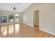 Bright living room featuring wood floors, recessed lighting, and abundant natural light at 3510 Shawn St, Punta Gorda, FL 33980