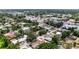Overhead view of homes surrounded by lush greenery, giving a sense of the community's landscape and setting at 3616 Stardust Pl, Sarasota, FL 34232