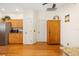 Kitchen area with hardwood floors, neutral walls, wood cabinets, and stainless steel appliances at 370 Londonderry Dr, Sarasota, FL 34240
