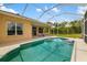 Inviting pool with an outdoor patio, perfect for relaxation and enjoying the backyard views at 370 Londonderry Dr, Sarasota, FL 34240