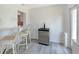 Open bar area features modern appliances and bar stool seating, with access to the kitchen at 415 Courbet Dr # 415, Nokomis, FL 34275