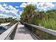 Scenic beach boardwalk offering easy access and stunning views with ample parking nearby at 415 Courbet Dr # 415, Nokomis, FL 34275