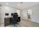 Office space with a modern desk setup, access to the kitchen at 415 Courbet Dr # 415, Nokomis, FL 34275