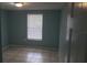 Cozy bedroom with tile flooring, a window, and neutral wall paint at 4304 78Th W St # 4304, Bradenton, FL 34209