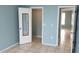 Comfortable bedroom featuring tile floors, ample closet space, and a closet with a mirror at 4304 78Th W St # 4304, Bradenton, FL 34209