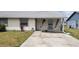Charming single story home with covered front porch and a well-maintained yard at 4304 78Th W St # 4304, Bradenton, FL 34209