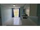 Modern kitchen with stainless steel appliances and a sliding glass door leading to the backyard at 4304 78Th W St # 4304, Bradenton, FL 34209