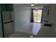 Bright, renovated kitchen overlooking the water with modern appliances and tile floors at 4304 78Th W St # 4304, Bradenton, FL 34209