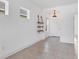 Bright entryway features neutral tile flooring and a decorative ladder accent at 4315 Deep Creek Ter, Parrish, FL 34219