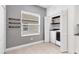 Laundry room with new washer, dryer, folding area and natural light from the window at 4315 Deep Creek Ter, Parrish, FL 34219