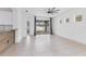 Open-concept living area with tile flooring, patio access, and ample natural light at 4315 Deep Creek Ter, Parrish, FL 34219