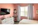 Cozy bedroom with natural light from the large window at 433 Cerromar Ln # 331, Venice, FL 34293