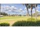 Scenic view of the lush golf course and community from the property at 433 Cerromar Ln # 331, Venice, FL 34293