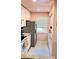 Bright kitchen with white cabinetry and stainless steel appliances at 433 Cerromar Ln # 331, Venice, FL 34293