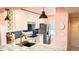 Updated kitchen with granite countertops and white cabinets at 433 Cerromar Ln # 331, Venice, FL 34293