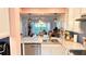 Updated kitchen with granite countertops and stainless steel dishwasher at 433 Cerromar Ln # 331, Venice, FL 34293
