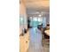 Open living room with tile flooring, ceiling fan, and sliding glass doors to the lanai at 433 Cerromar Ln # 331, Venice, FL 34293