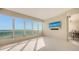 Serene bedroom with large windows offering panoramic ocean views and plenty of sunlight at 435 L Ambiance Dr # K506, Longboat Key, FL 34228