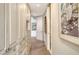 Hallway features custom built-in storage and convenient access to rooms at 435 L Ambiance Dr # K506, Longboat Key, FL 34228