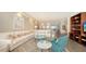 Comfortable living room with ocean view in the background at 435 L Ambiance Dr # K506, Longboat Key, FL 34228