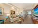Elegant living room with hardwood floors, ocean views, and stylish decor at 435 L Ambiance Dr # K506, Longboat Key, FL 34228