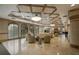 This elegant lobby showcases coffered ceilings, comfortable seating, arched windows, and a grand piano at 435 L Ambiance Dr # K506, Longboat Key, FL 34228