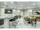 This inviting lounge area features a modern countertop, comfortable seating, and stylish artwork for residents at 435 L Ambiance Dr # K506, Longboat Key, FL 34228