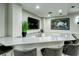 This comfortable lounge area features a modern countertop, comfortable seating, and stylish artwork for residents at 435 L Ambiance Dr # K506, Longboat Key, FL 34228