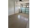Empty garage space with an automatic garage door and a door to the exterior at 4613 Muirfield Dr, Bradenton, FL 34210
