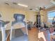 Well-equipped fitness center with treadmills, weights, and various exercise machines at 4726 Potomac Cir, Bradenton, FL 34210