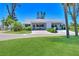 Well maintained exterior of home with nice landscaping and driveway with car port at 4726 Potomac Cir, Bradenton, FL 34210