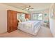 Serene bedroom with a queen bed, built-in wardrobe, and a window overlooking the outdoors at 4726 Potomac Cir, Bradenton, FL 34210