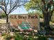 Entrance to G.T. Bray Park featuring a large sign, lush greenery, and inviting atmosphere at 4726 Potomac Cir, Bradenton, FL 34210