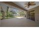Enjoy outdoor living on this spacious screened-in lanai overlooking the lake at 4978 Cedar Oak Way, Sarasota, FL 34233