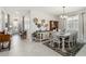 Dining area with decorative wall art, cabinet, and lots of natural light from nearby windows at 5165 Coral Reef Way, Bradenton, FL 34211