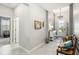 Welcoming entryway with neutral colors, tile flooring, and elegant decor at 5165 Coral Reef Way, Bradenton, FL 34211