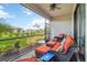 Relax on the screened lanai with comfortable seating and a view of the beautifully landscaped backyard at 5165 Coral Reef Way, Bradenton, FL 34211