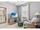 Relaxing living room with comfortable seating, a TV, and stylish decor, creating a cozy atmosphere at 5165 Coral Reef Way, Bradenton, FL 34211