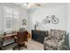 Cozy office space with a ceiling fan, a desk, comfortable chair, and stylish decor at 5165 Coral Reef Way, Bradenton, FL 34211